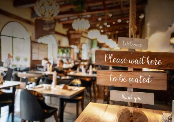 Firefly busy restaurant interior with professional equipment; wooden menu boards and wooden signs